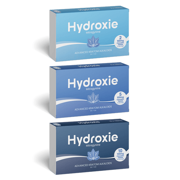 Three boxes of Hydroxie Mitragynine on a green background